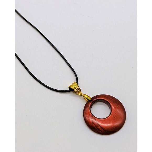 Red Circular Pendant Necklace With Gold Bail On Black Cord - Picture 1 of 5